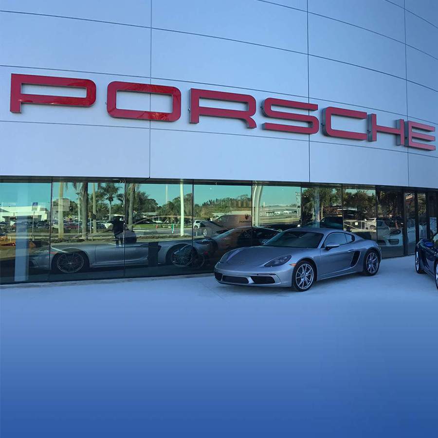 [caption: Porsche</br />Dealership] Porsche Dealership